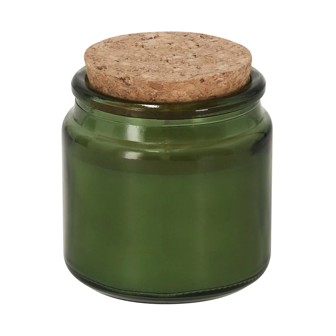 Candela Aromatica Fermix nel vetro verde scuro
